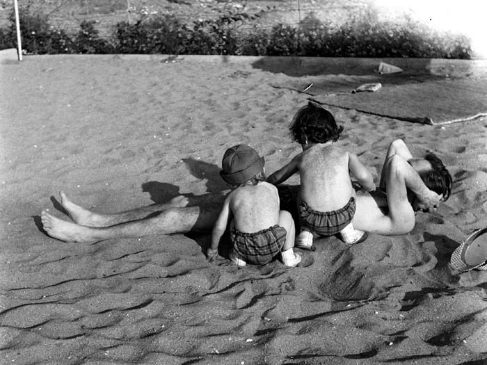 Gün and Olgun burying their father in sand. Istanbul 1965. Photograph: Yıldız Moran